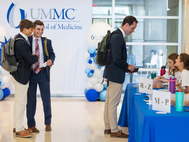 Students checking in at the M1 Student Orientation.